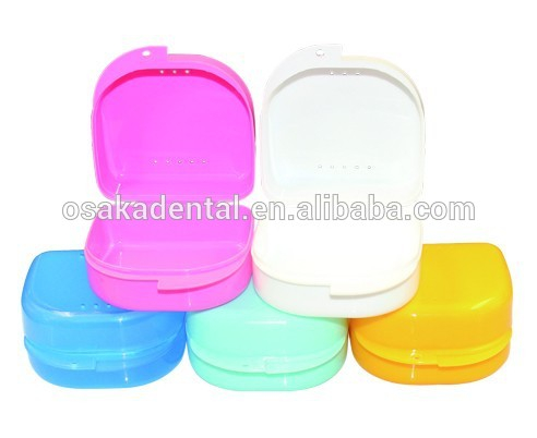 Caja plástica colorida de la dentadura para la venta limpia